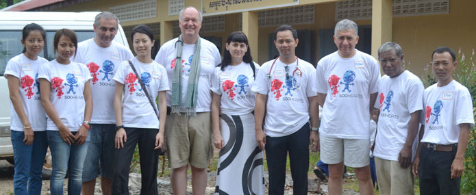 Medical team from international organization "500 Hearts" poses with local support staff in Cambodia.