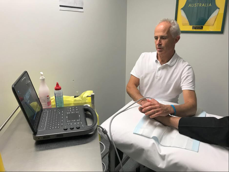 Dr Paul Blackman Scans Patient with Sonosite Ultrasound Machine