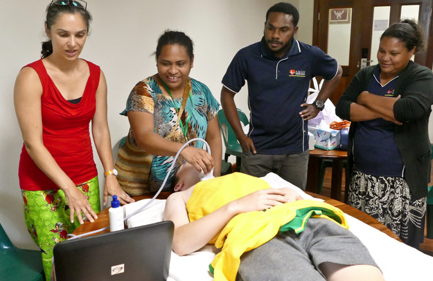 Clinician using Sonosite ultrasound in Papua New Guinea
