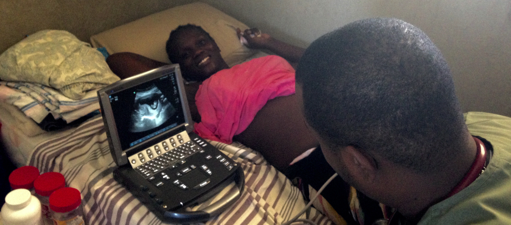 The IWISH team helping doctors use Sonosite ultrasound equipment in Haiti
