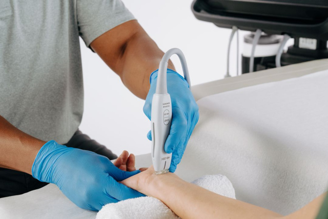 UHF Probe close up to median nerve. It is performing a carpal tunnel assessment for hand surgery.